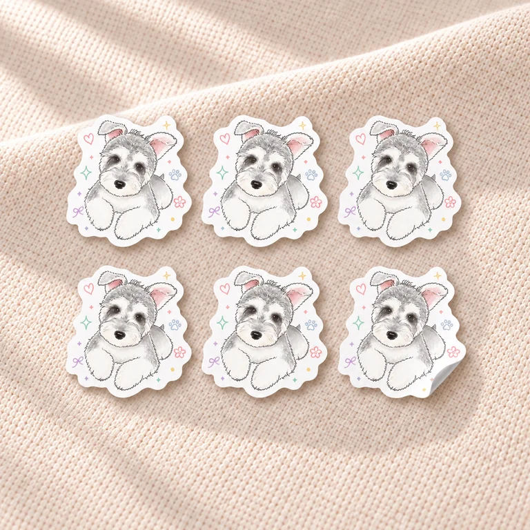 Design mockup of six adhesive stickers with the same original Chibi Color Cartoon schnauzer artwork on warm cream linen